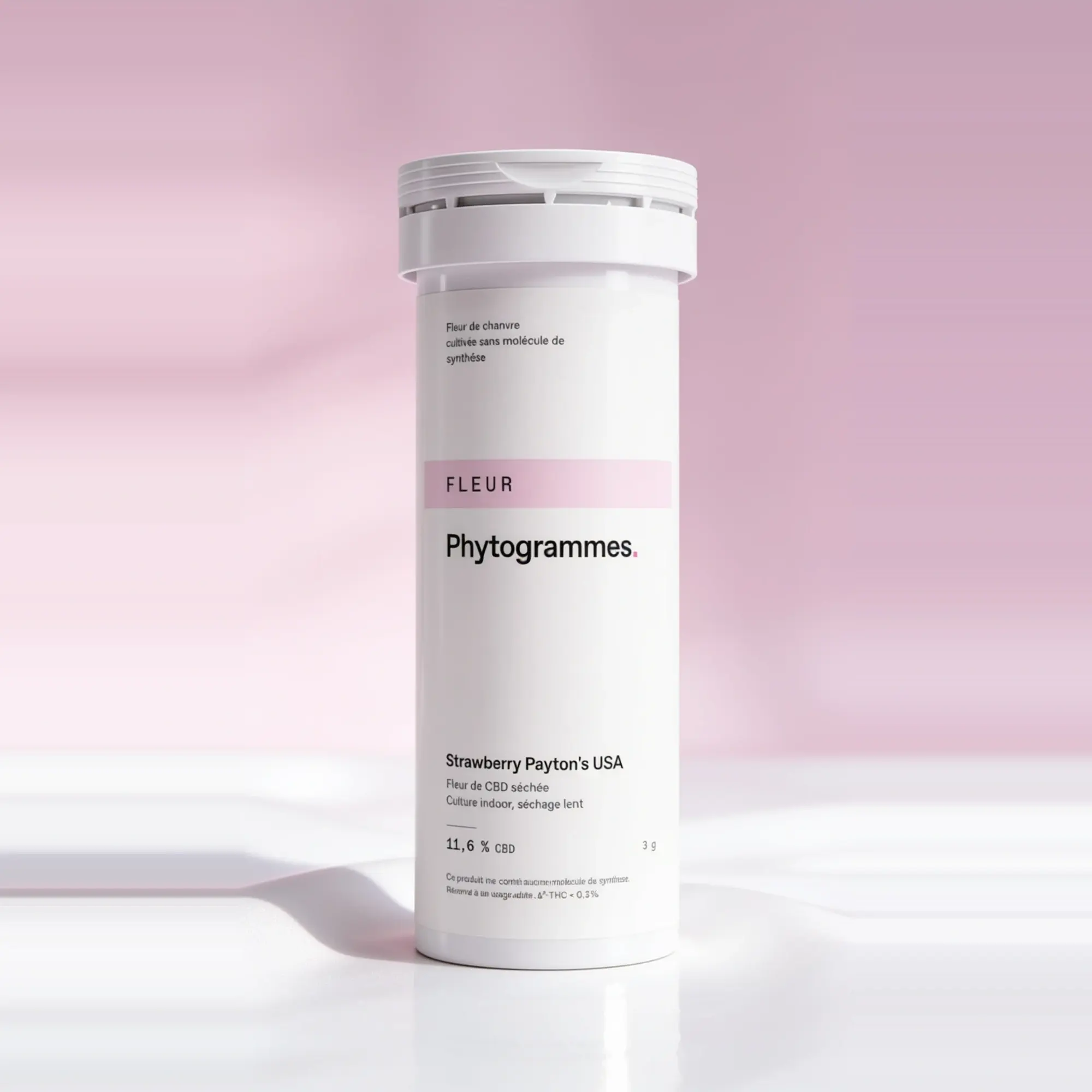 Bouteille Phytogrammes, fleur de CBD, sur fond rose